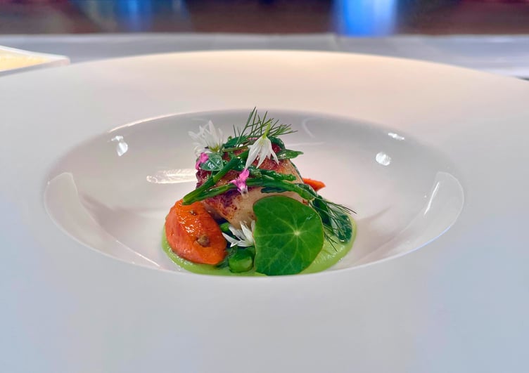 Plate of pea and scallop.