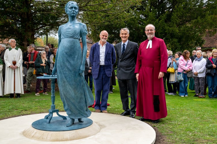 Sculptor Martin Jennings, Hampshire Lord-Lieutenant Nigel Atkinson, and the Reverend Canon Dr Roland Riem at the unveiling of a Jane Austen statue at Winchester Cathedral.