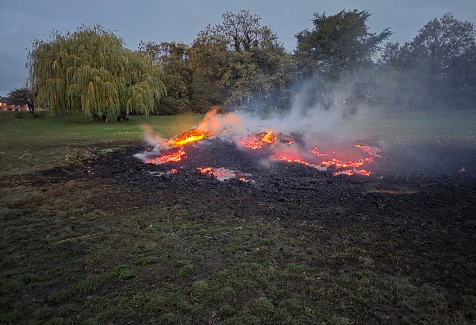 <p>The smouldering remains of the bonfire tower built for the Ripley Bonfire event.</p>