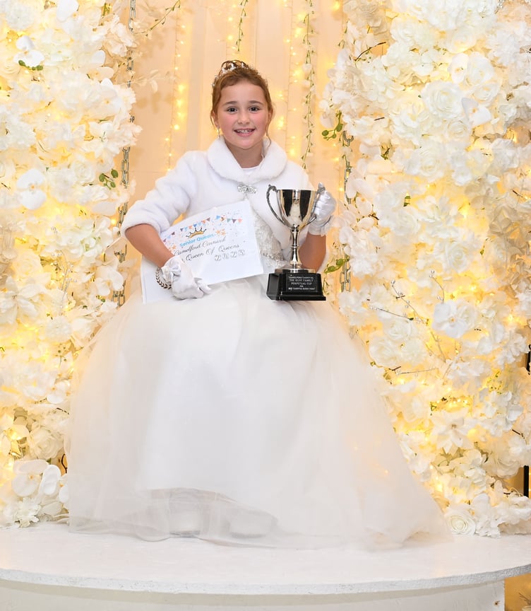 Bella Heywood, Launceston Carnival Queen, proudly shows off her Hunt Family Perpetual Cup for best Carnival Queen Float (Picture: Adrian Jasper)