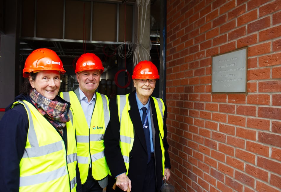 <p>Chris Tuckwell, president of Phyllis Tuckwell and son of Sir Edward and Phyllis, with chief executive Sarah Church and chair of the trustees Dr Robert Laing lay the new hospice's foundation stone.</p>