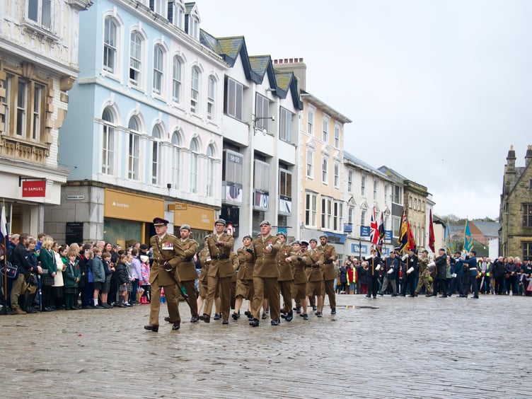 Remembrance Sunday parade in Truro's Boscawen Street