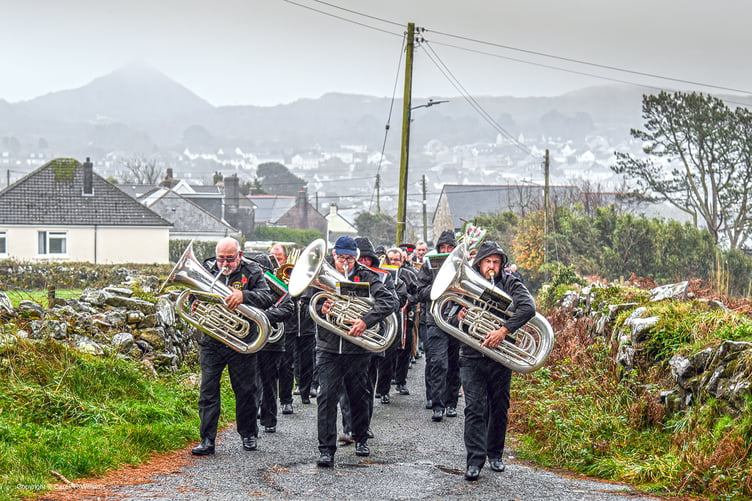 The parade, led by the St Dennis Band, going towards the church. (Picture: Derek R Williams)