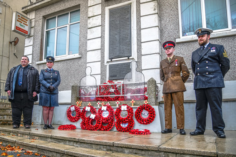 Ian Lobb of the Royal British Legion and representatives from the armed services at the St Dennis War Memorial Institute. (Picture: Derek R Williams)