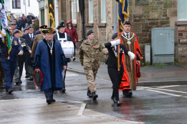 Cllr Jon Hutchings, the mayor of Holsworthy leads the parade through the town. (Picture: Rodney Parrish)