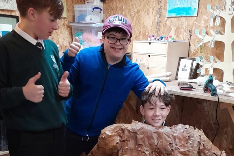 Kids at space2grow make their Guy for Farnham's fireworks event.