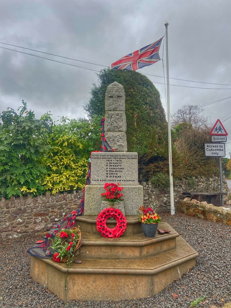 Wreaths and flowers laid at Cutcombe War Memorial. PHOTO: Leanna Coles.
