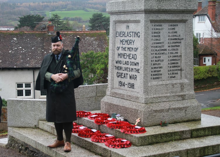 A lone piper at Minehead War Memorial played 'Amazing Grace' after a two-minute Armistice Day silence PHOTO: George Ody.