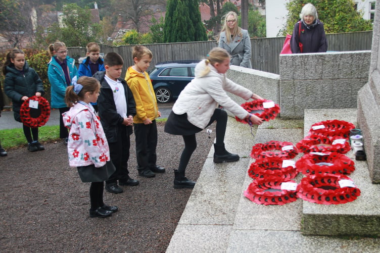 Wreaths were laid on Tuesday at Minehead War Memorial by some of the town's schoolchildren PHOTO: George Ody.