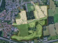 Developer unveils Hogs Back plans for hundreds of new homes