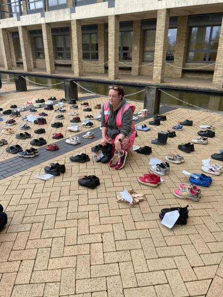 Abi Shepherd among the SEND shoe protest at Surrey County Council headquarters.