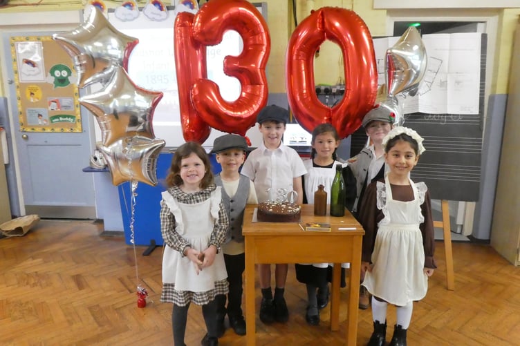 Badshot Lea pupils celebrating the school's 130th birthday.
