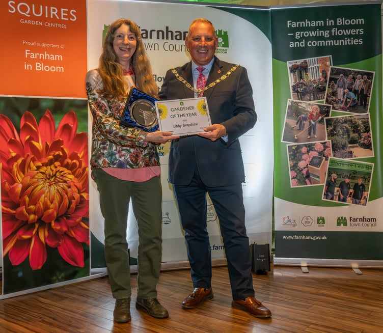 Libby Brayshaw collects her Farnham in Bloom Community Award.