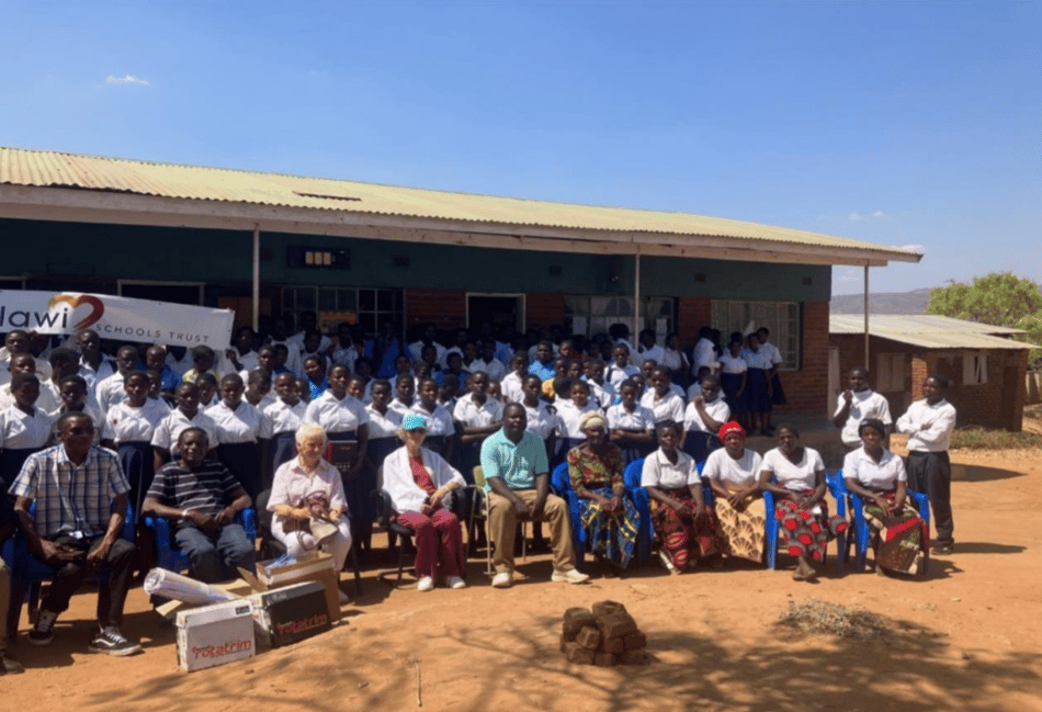 <p>From left: Oscar Mponda, country director of the Malawi Schools Trust, Brodie Mauluka, Ann Foster and Norma Corkish.</p>
