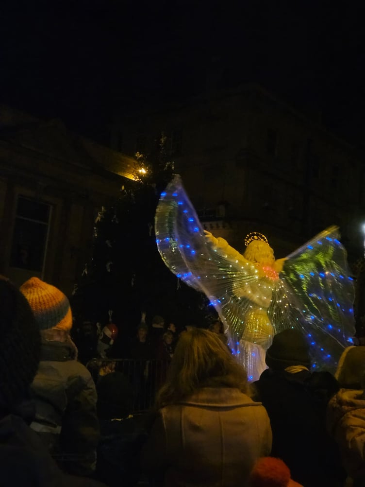 Crowds gather to watch the Christmas light switch-on.