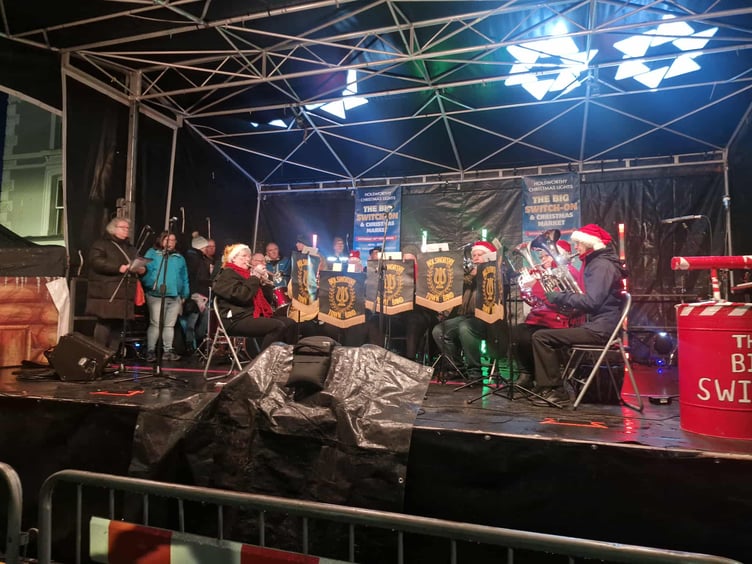Holsworthy Town Band performing on stage to make the occasion festive (Picture: Nigel Kenneally)