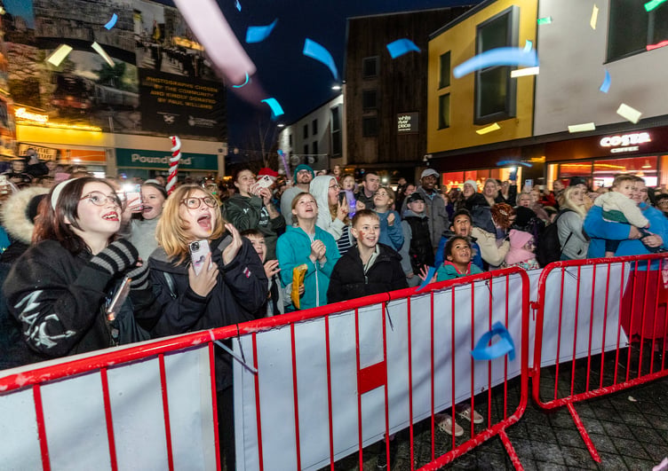 Confetti flies into the air at the lights switch-on in St Austell. (Picture: Paul Williams)