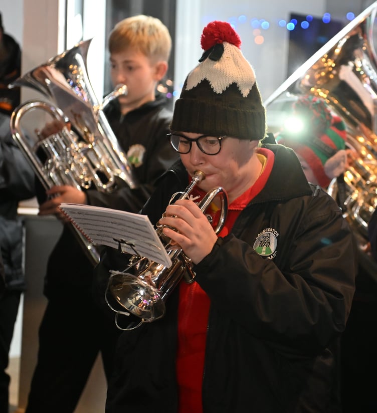 Gemma Brown on her cornet of the Launceston Town Band playing some traditional carols to get the crowd in the festive spirit (Picture: Adrian Jasper)