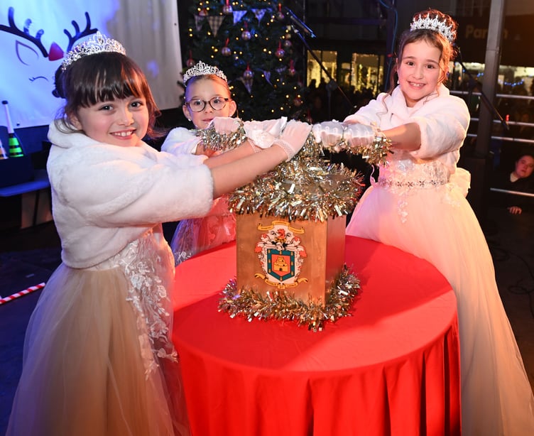 The moment arrives for the Launceston carnival Queen Bella Heywood along with attendants Harper Chandler and Daisy Neale as they prepare to start the festive celebrations for the town (Picture: Adrian Jasper)
