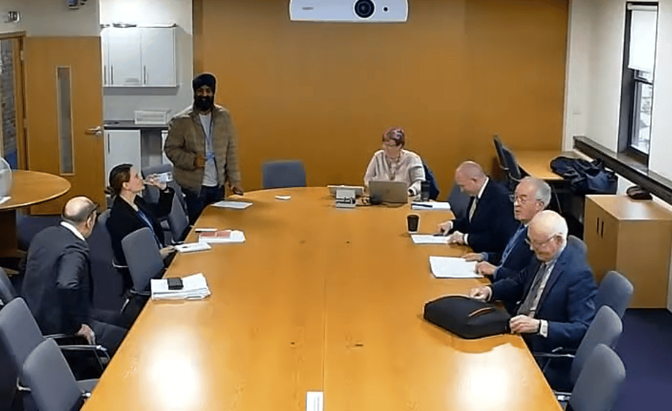 <p>Store owner Manpreet Singh addresses Waverley Borough Council's Licensing Sub-committee on December 1, 2025.</p>