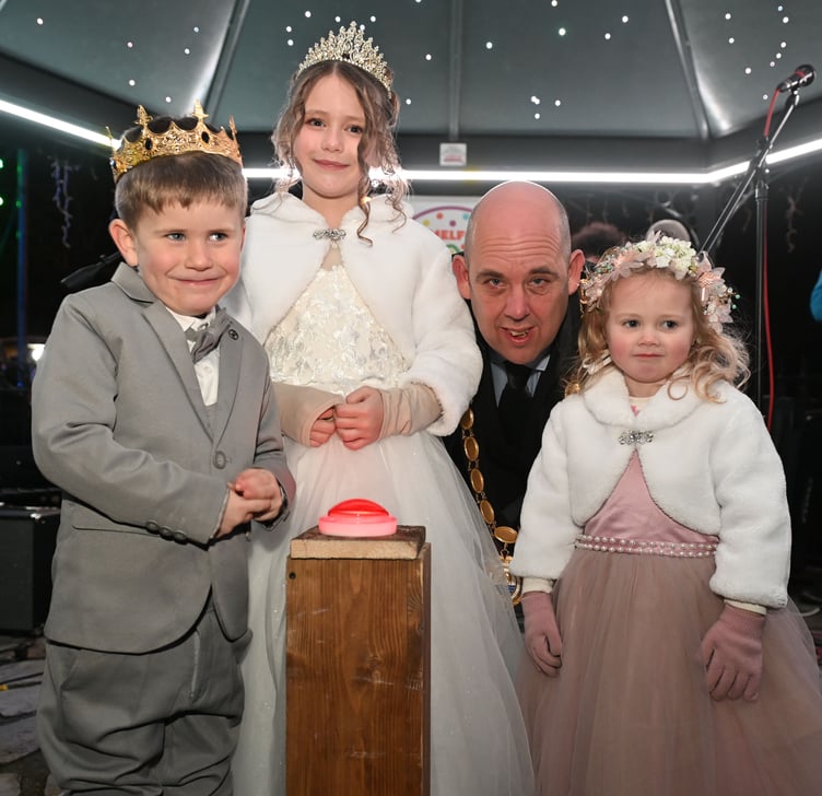 Camelford mayor Stephen Bond along with the Camelford Royalty Group Izzy (Carnival Queen) along with attendants Thomas and Ava gets Camelford lit up for Christmas (Picture: Adrian Jasper)
