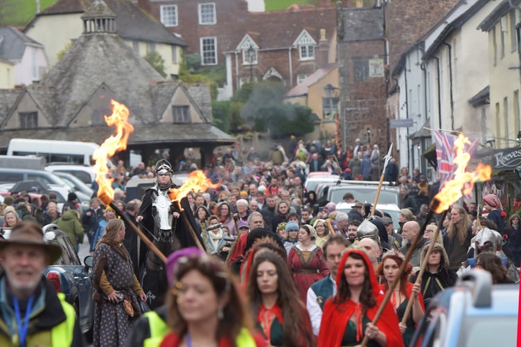 Hundreds of people joined a lighted torch procession through the centre of Dunster during the village's winter festival. PHOTO: Nina Dodd.
