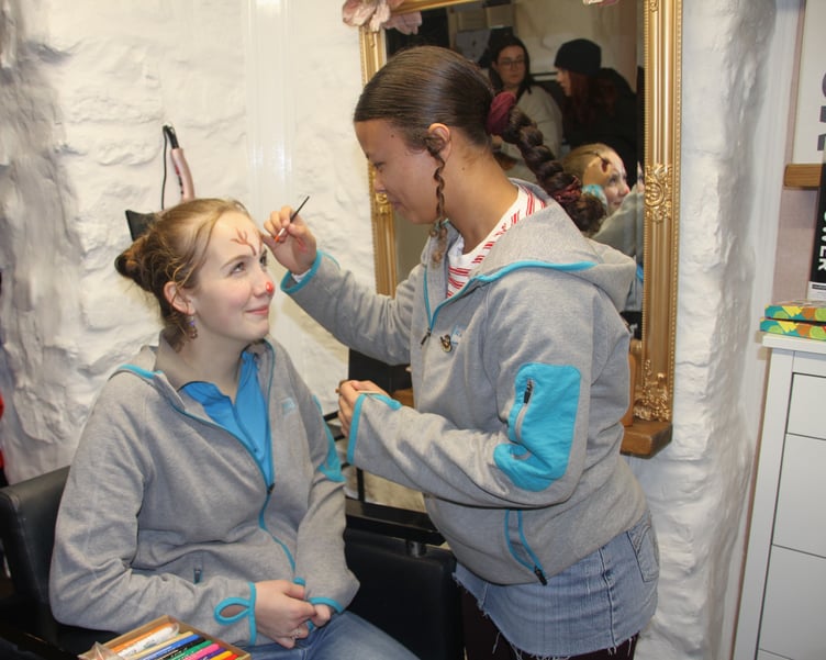 Face painting with Lottie Humphries and Jayda Swaby-Halls during Watchet's late night extravaganza. PHOTO: George Ody.