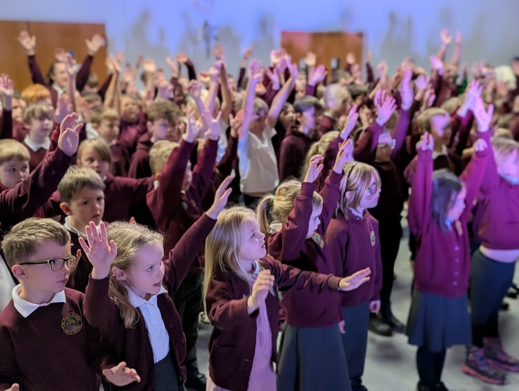 St Mary's schoolchildren singing 'Midnight'. (Picture: Mark and Helen Johnson, Out of the Ark)
