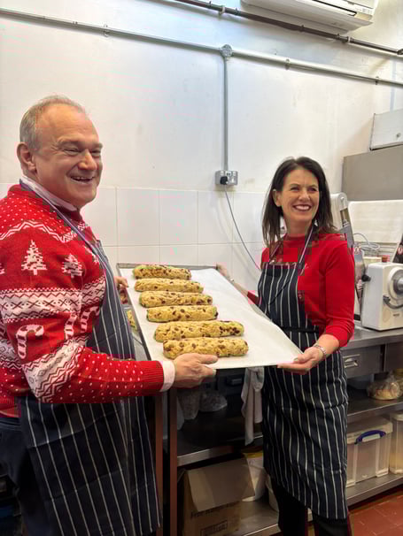 Ed Davey MP and Monica Harding MP after making Stollen in Bachmanns in Thames Ditton. (Credit: Emily Dalton/ LDRS)