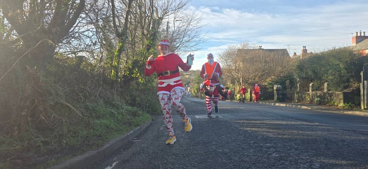 Members of Camelford Up and Running taking to the town in festive style (Picture: Matt Allan)
