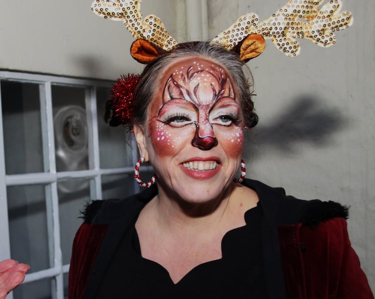 Becky Shaw, of Wistaway, proved facepainting is not just for children during Porlock's Christmas lights switch on evening. PHOTO: George Ody.
