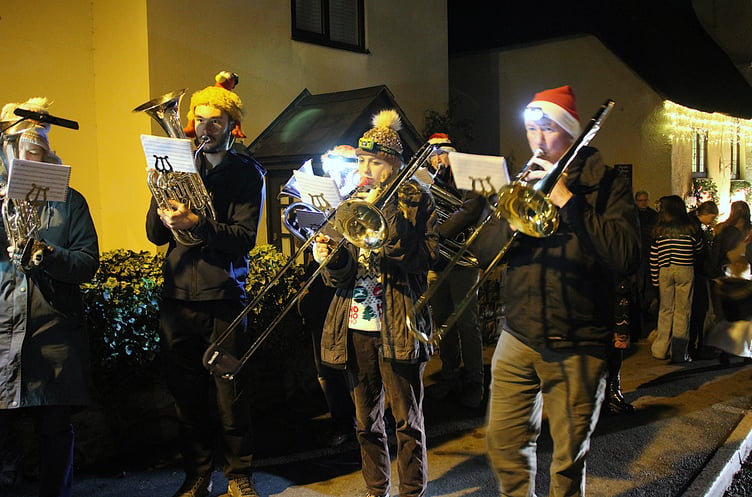 West Somerset Brass entertained the crowds during late night shopping as Christmas lights were switched on in Porlock. PHOTO: George Ody.