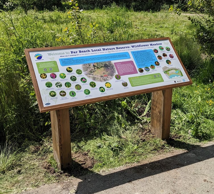 The wildflower meadow information board that was installed a couple of years ago. (Picture: Friends of Par Beach)