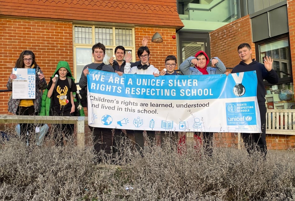<p>Pupils at Undershaw Education Trust celebrate their UNICEF Silver Rights Respecting School Award</p>
