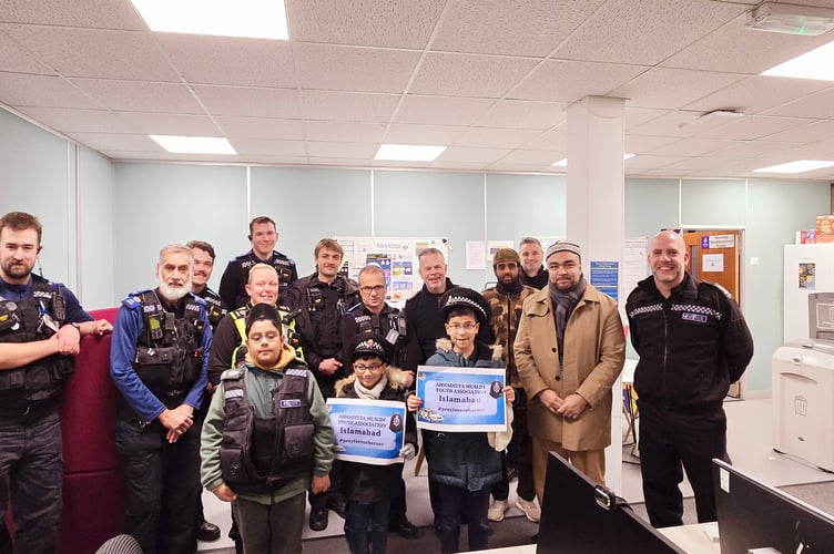 Members of the Ahmadiyya Muslim Youth Association visit Waverley Borough Police on New Year’s Eve.