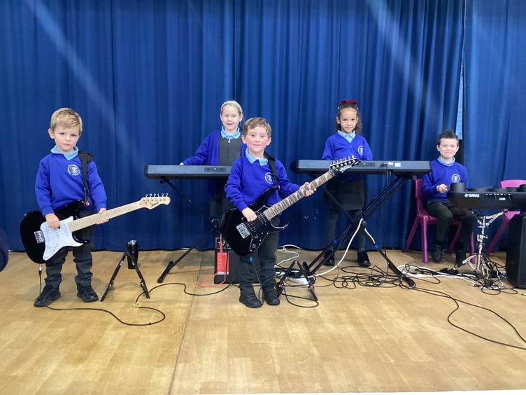 Young musicians perform together during a Rocksteady concert held at St Benedict’s Catholic Primary School.