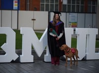 WATCH: Medical alert dog helps woman achieve law career dream