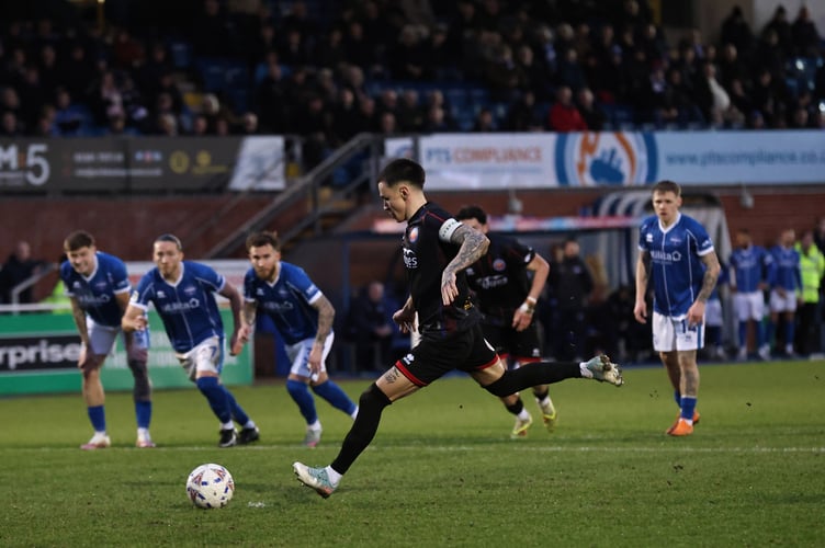 Ryan Hill's penalty put Aldershot 4-1 up (Photo: Ian Morsman)