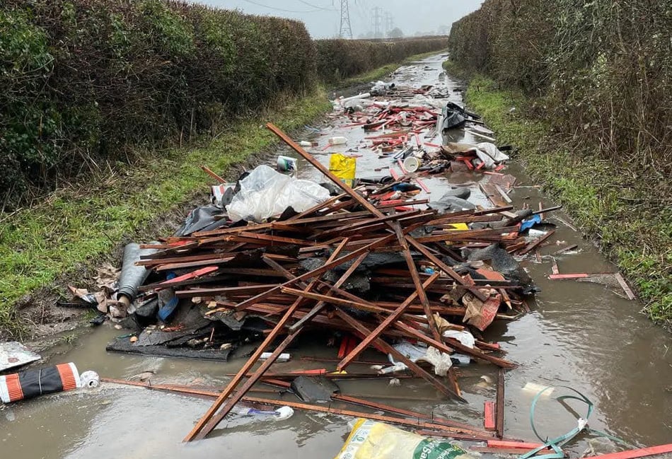 <p>Building waste was dumped on a long section of Wyck Lane sometime before Wednesday.</p>