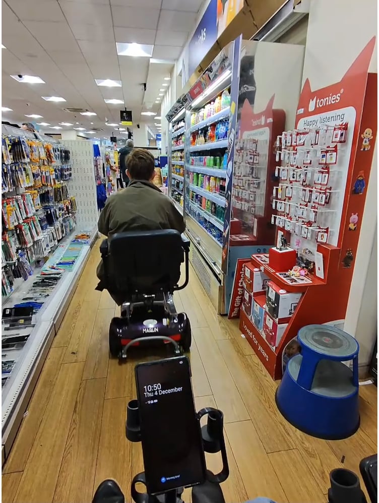 Cornwall Council chief executive Kate Kennally navigates TG Jones in an electric wheelchair