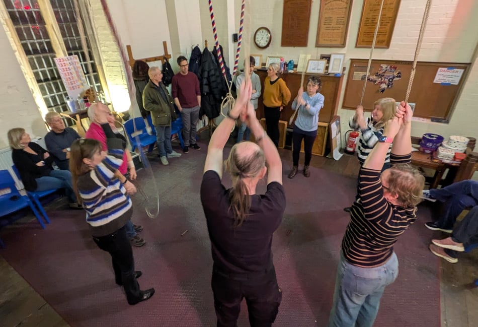 <p>Bellringers at St Mary's Liss get into the swing of things during their Friday night session.</p>
