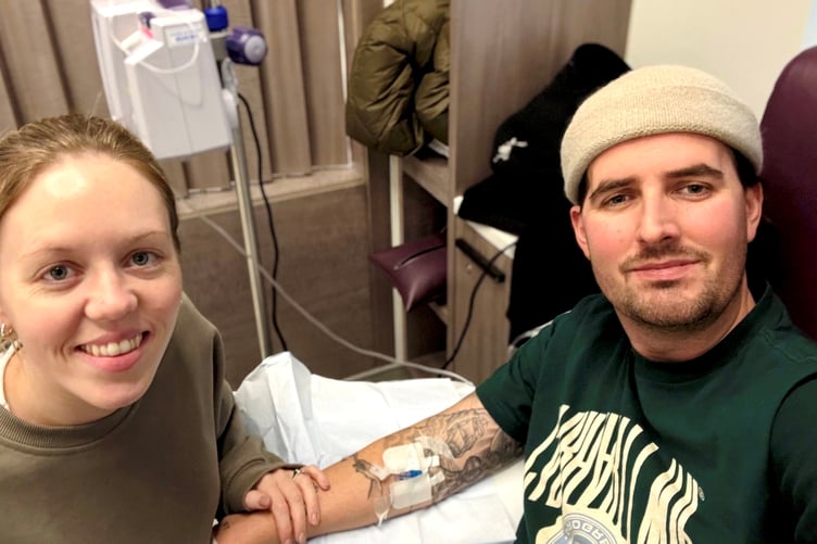 Josuha Baines with wife Daisy in hospital. A dad of three, was told he was just dehydrated, before being diagnosed with a terminal brain tumour. Josuha Baines, 34, was found lying unconscious and covered in blood by his daughter, then 4, in 2021, following a seizure. The vicar, from Esher, Surrey, was rushed to hospital, but doctors told him the seizure was just due to dehydration.A few weeks later, Josh had another seizure, and he was eventually diagnosed with an aggressive terminal brain tumour in 2022.