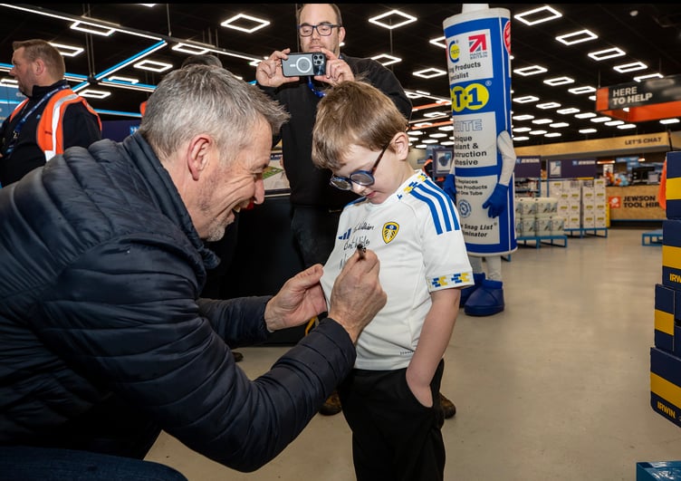 Nigel Martyn signs a shirt for young Leeds fan William who attends Nigel’s old St Austell school, Mount Charles Primary. (Picture: Paul Williams)