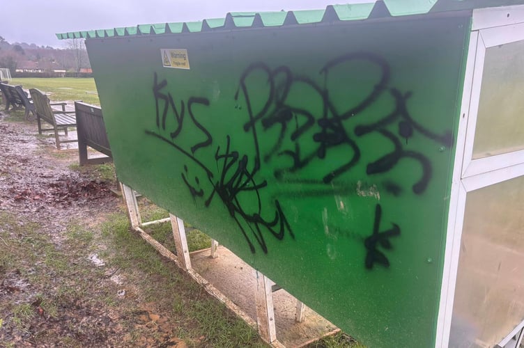 Graffiti sprayed on a dugout at Liphook United FC’s home ground as the club was hit by yet another act of vandalism.