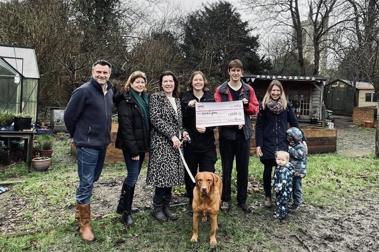 Space2grow community well-being garden in Farnham receives a £2,000 cheque from the Tilford Village Fete committee, February 6th 2026.