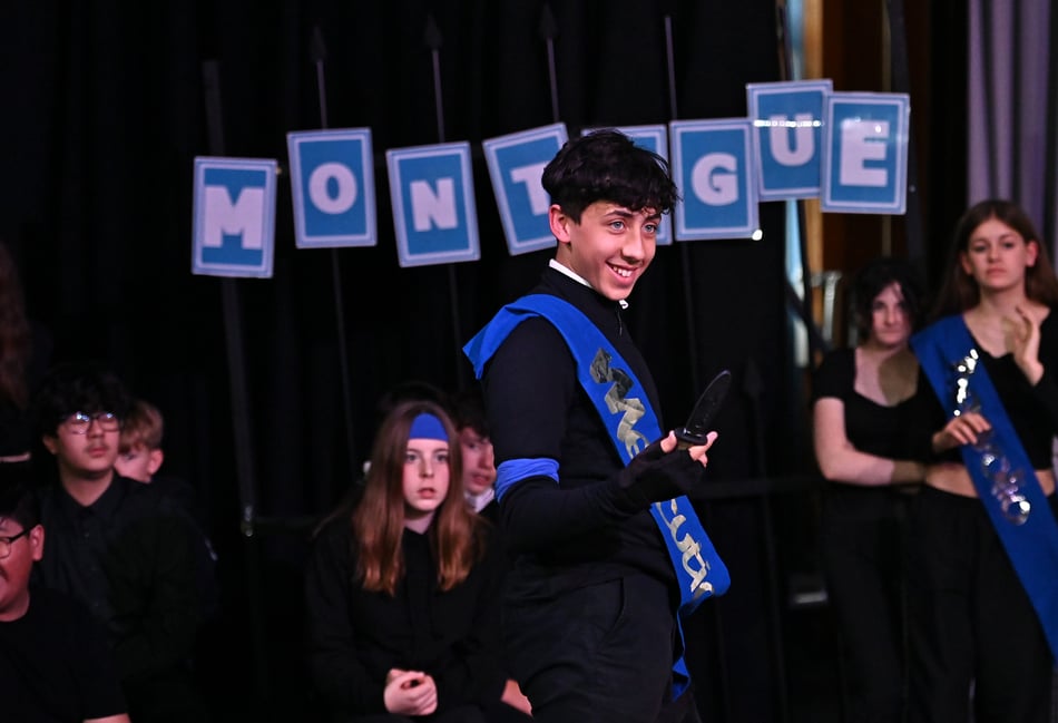 <p>Pupils from Collingwood College in Camberley act out a knife-wielding scenario in a production of Romeo and Juliet as part of Guildford Shakespeare Company's Put Up Your Swords knife crime awareness programme (Photo: Darren Pepe).</p>