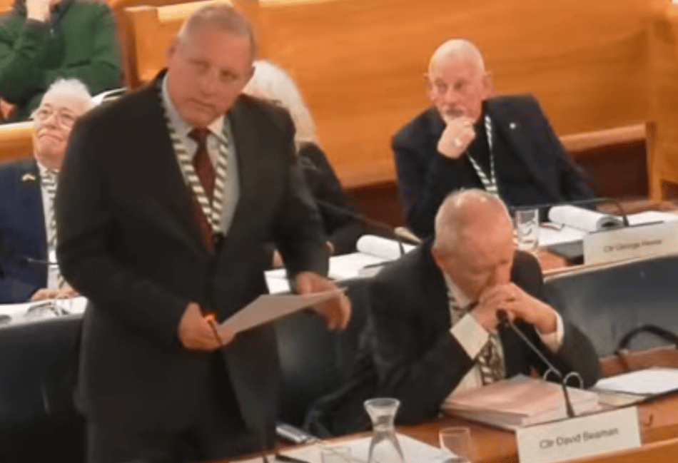 <p>Cllr George Murray speaking at Waverley Borough Council's Budget meeting.</p>