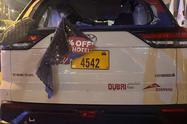 Damage to a taxi in Dubai after the alleged drone attack.