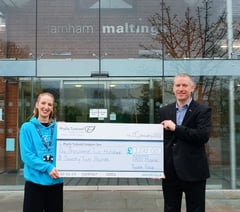 Musical group's £1,272 show of support for hospice