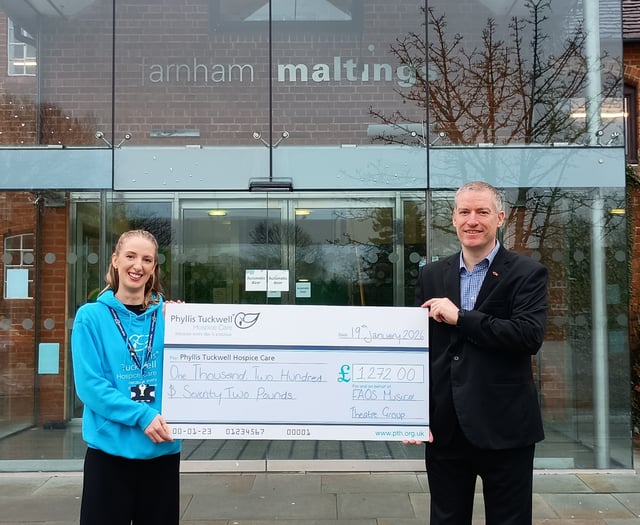 Musical group's £1,272 show of support for hospice